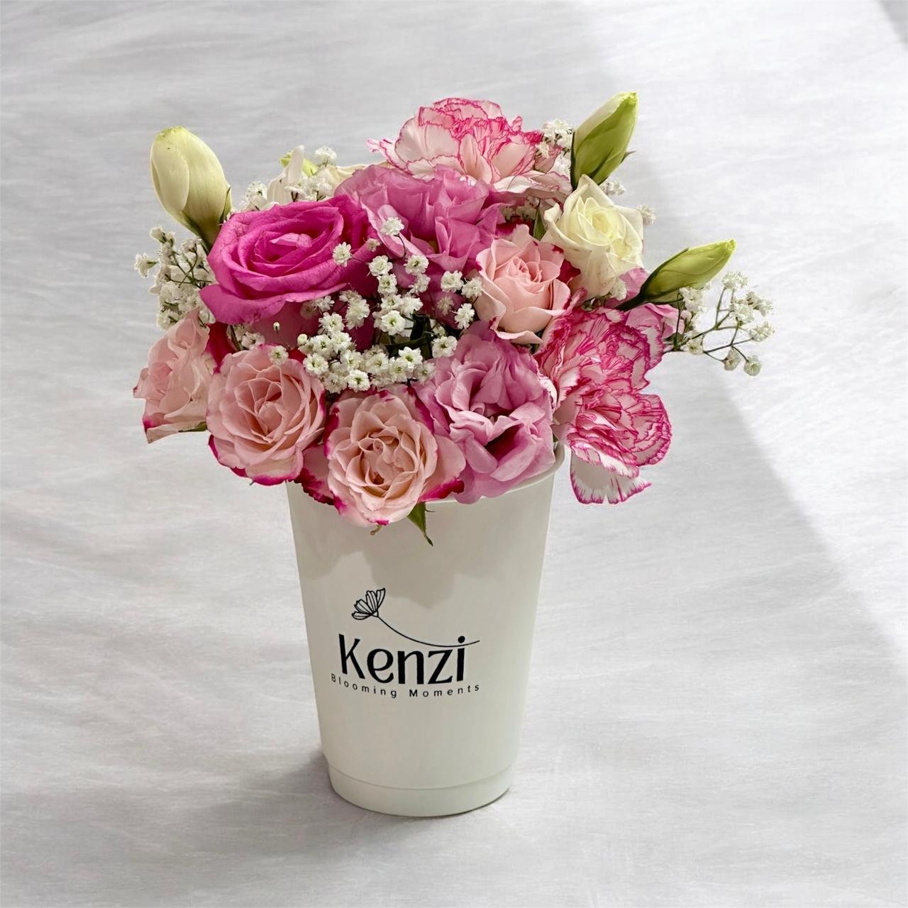 2026/04/1000048151.jpg pink flowers in a coffee cup - Image 1