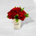 Red flowers in coffee cup