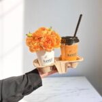 orange iced latte with orange flowers combo