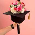 graduation hat arrangement with fresh flowers