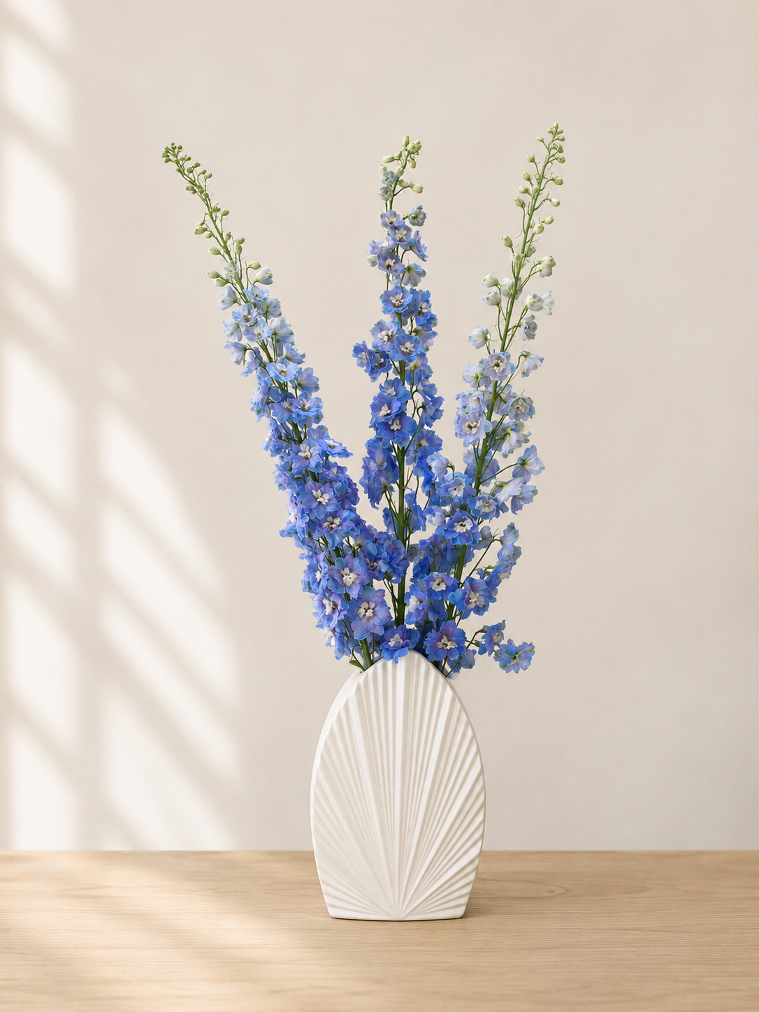 79e31412-e02d-4916-88f5-75490b294e49-2 Blue Delphinium in Elegant Vase - Image 1